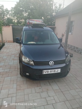 VW Caddy 1.6 tdi 102 ks.